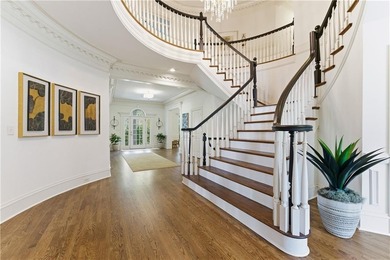 COMMANDING MASSIVE PALATIAL COLUMNS, THIS SUGARLOAF COUNTRY CLUB on TPC At Sugarloaf Golf Club in Georgia - for sale on GolfHomes.com, golf home, golf lot