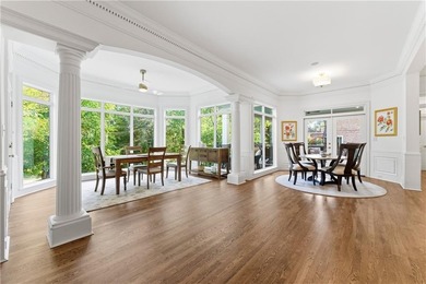 COMMANDING MASSIVE PALATIAL COLUMNS, THIS SUGARLOAF COUNTRY CLUB on TPC At Sugarloaf Golf Club in Georgia - for sale on GolfHomes.com, golf home, golf lot