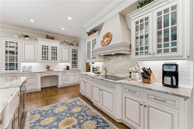 COMMANDING MASSIVE PALATIAL COLUMNS, THIS SUGARLOAF COUNTRY CLUB on TPC At Sugarloaf Golf Club in Georgia - for sale on GolfHomes.com, golf home, golf lot