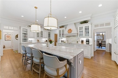 COMMANDING MASSIVE PALATIAL COLUMNS, THIS SUGARLOAF COUNTRY CLUB on TPC At Sugarloaf Golf Club in Georgia - for sale on GolfHomes.com, golf home, golf lot