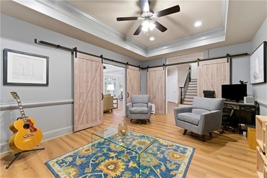 COMMANDING MASSIVE PALATIAL COLUMNS, THIS SUGARLOAF COUNTRY CLUB on TPC At Sugarloaf Golf Club in Georgia - for sale on GolfHomes.com, golf home, golf lot