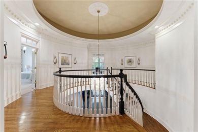 COMMANDING MASSIVE PALATIAL COLUMNS, THIS SUGARLOAF COUNTRY CLUB on TPC At Sugarloaf Golf Club in Georgia - for sale on GolfHomes.com, golf home, golf lot