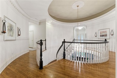 COMMANDING MASSIVE PALATIAL COLUMNS, THIS SUGARLOAF COUNTRY CLUB on TPC At Sugarloaf Golf Club in Georgia - for sale on GolfHomes.com, golf home, golf lot