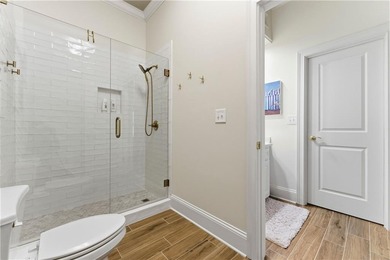 COMMANDING MASSIVE PALATIAL COLUMNS, THIS SUGARLOAF COUNTRY CLUB on TPC At Sugarloaf Golf Club in Georgia - for sale on GolfHomes.com, golf home, golf lot