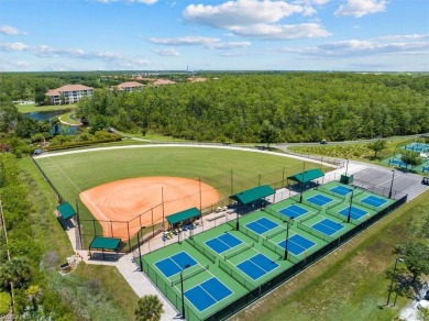 Check out this lovely VILLA with a VIEW in Pelican Preserve - on Pelican Preserve Golf Club in Florida - for sale on GolfHomes.com, golf home, golf lot