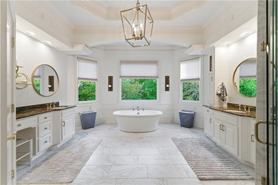 COMMANDING MASSIVE PALATIAL COLUMNS, THIS SUGARLOAF COUNTRY CLUB on TPC At Sugarloaf Golf Club in Georgia - for sale on GolfHomes.com, golf home, golf lot