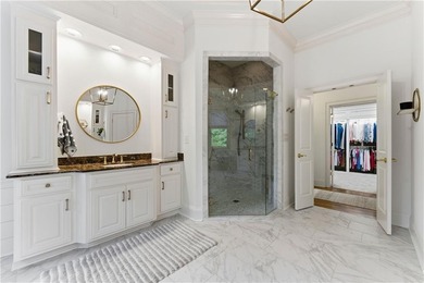 COMMANDING MASSIVE PALATIAL COLUMNS, THIS SUGARLOAF COUNTRY CLUB on TPC At Sugarloaf Golf Club in Georgia - for sale on GolfHomes.com, golf home, golf lot