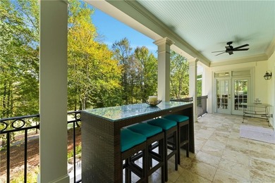 COMMANDING MASSIVE PALATIAL COLUMNS, THIS SUGARLOAF COUNTRY CLUB on TPC At Sugarloaf Golf Club in Georgia - for sale on GolfHomes.com, golf home, golf lot