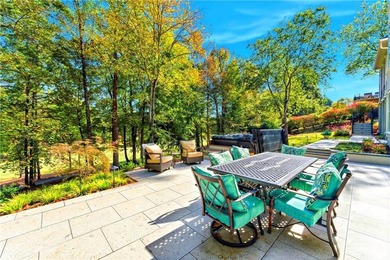 COMMANDING MASSIVE PALATIAL COLUMNS, THIS SUGARLOAF COUNTRY CLUB on TPC At Sugarloaf Golf Club in Georgia - for sale on GolfHomes.com, golf home, golf lot