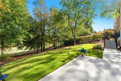 COMMANDING MASSIVE PALATIAL COLUMNS, THIS SUGARLOAF COUNTRY CLUB on TPC At Sugarloaf Golf Club in Georgia - for sale on GolfHomes.com, golf home, golf lot