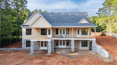 New Construction home in Tillery Tradition located overlooking on The Tillery Tradition Country Club in North Carolina - for sale on GolfHomes.com, golf home, golf lot