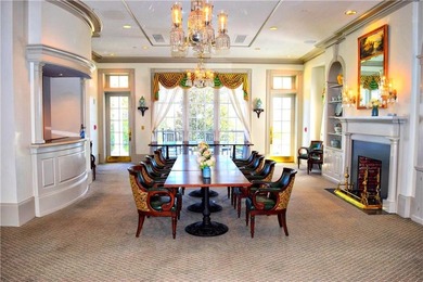 COMMANDING MASSIVE PALATIAL COLUMNS, THIS SUGARLOAF COUNTRY CLUB on TPC At Sugarloaf Golf Club in Georgia - for sale on GolfHomes.com, golf home, golf lot