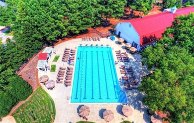 COMMANDING MASSIVE PALATIAL COLUMNS, THIS SUGARLOAF COUNTRY CLUB on TPC At Sugarloaf Golf Club in Georgia - for sale on GolfHomes.com, golf home, golf lot