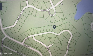 Center of Tellico Village to build your dream home.  This lot is on Toqua Golf Course - Loudon County in Tennessee - for sale on GolfHomes.com, golf home, golf lot