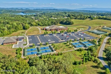Center of Tellico Village to build your dream home.  This lot is on Toqua Golf Course - Loudon County in Tennessee - for sale on GolfHomes.com, golf home, golf lot