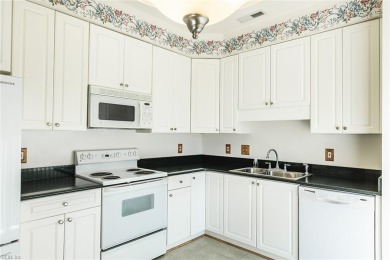 Welcome to this beautiful, all brick, end unit town home located on Cypress Point Country Club in Virginia - for sale on GolfHomes.com, golf home, golf lot
