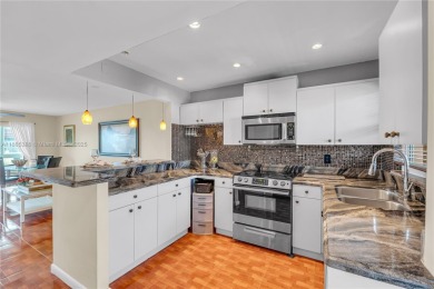 55+ Updated 2-bed/2-bath Condo W/ Full Impact Windows Front And on Sunrise Lakes Phase III in Florida - for sale on GolfHomes.com, golf home, golf lot