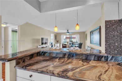 55+ Updated 2-bed/2-bath Condo W/ Full Impact Windows Front And on Sunrise Lakes Phase III in Florida - for sale on GolfHomes.com, golf home, golf lot
