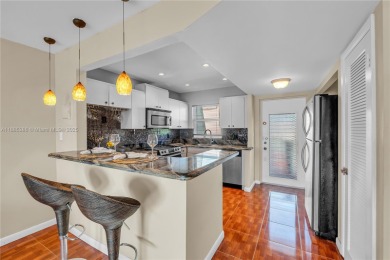 55+ Updated 2-bed/2-bath Condo W/ Full Impact Windows Front And on Sunrise Lakes Phase III in Florida - for sale on GolfHomes.com, golf home, golf lot