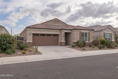 Located on a premium homesite with no backyard neighbors, this on Poston Butte Golf Club in Arizona - for sale on GolfHomes.com, golf home, golf lot