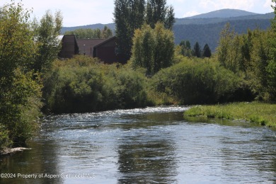 This .44-acre homesite in the Ranch at Roaring Fork has Sopris on Ranch at Roaring Fork Golf Course in Colorado - for sale on GolfHomes.com, golf home, golf lot