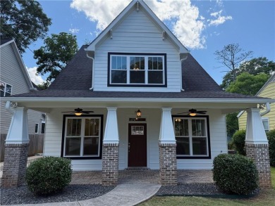 Welcome to this stunning 4-bedroom, 4-bathroom home located in on East Lake Golf Club in Georgia - for sale on GolfHomes.com, golf home, golf lot
