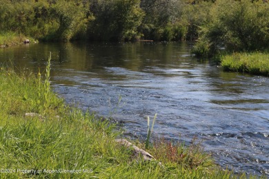 This .44-acre homesite in the Ranch at Roaring Fork has Sopris on Ranch at Roaring Fork Golf Course in Colorado - for sale on GolfHomes.com, golf home, golf lot