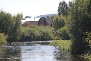 This .44-acre homesite in the Ranch at Roaring Fork has Sopris on Ranch at Roaring Fork Golf Course in Colorado - for sale on GolfHomes.com, golf home, golf lot