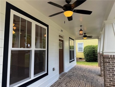 Welcome to this stunning 4-bedroom, 4-bathroom home located in on East Lake Golf Club in Georgia - for sale on GolfHomes.com, golf home, golf lot