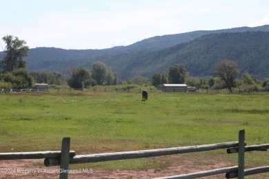 This .44-acre homesite in the Ranch at Roaring Fork has Sopris on Ranch at Roaring Fork Golf Course in Colorado - for sale on GolfHomes.com, golf home, golf lot