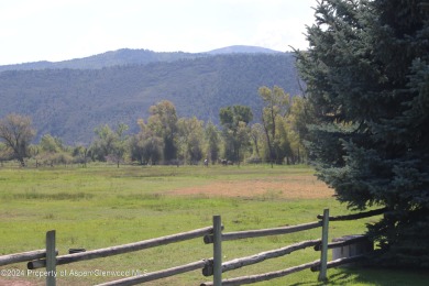 This .44-acre homesite in the Ranch at Roaring Fork has Sopris on Ranch at Roaring Fork Golf Course in Colorado - for sale on GolfHomes.com, golf home, golf lot