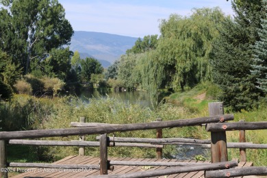 This .44-acre homesite in the Ranch at Roaring Fork has Sopris on Ranch at Roaring Fork Golf Course in Colorado - for sale on GolfHomes.com, golf home, golf lot