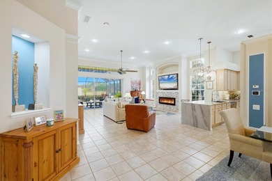 Tucked within the prestigious gates of University Park Country on University Park Country Club in Florida - for sale on GolfHomes.com, golf home, golf lot