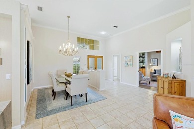 Tucked within the prestigious gates of University Park Country on University Park Country Club in Florida - for sale on GolfHomes.com, golf home, golf lot