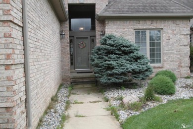 This is a rare find.  2102 square foot one story villa over on Carrington Golf Club in Michigan - for sale on GolfHomes.com, golf home, golf lot