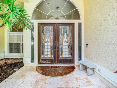 Welcome to your dream home in the highly-desirable gated on Hunters Green Country Club in Florida - for sale on GolfHomes.com, golf home, golf lot
