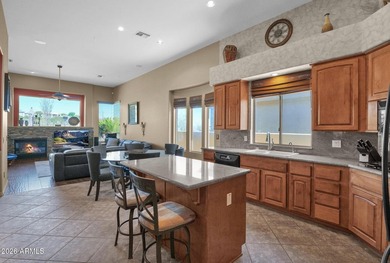 Executive golf course home in Sunridge Canyon overlooking the on SunRidge Canyon Golf Club in Arizona - for sale on GolfHomes.com, golf home, golf lot