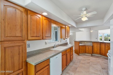 This charming 2-bedroom, 2-bathroom home spans 1,628 sqft and is on Sun City Riverview Golf Course in Arizona - for sale on GolfHomes.com, golf home, golf lot