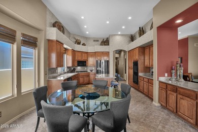 Executive golf course home in Sunridge Canyon overlooking the on SunRidge Canyon Golf Club in Arizona - for sale on GolfHomes.com, golf home, golf lot