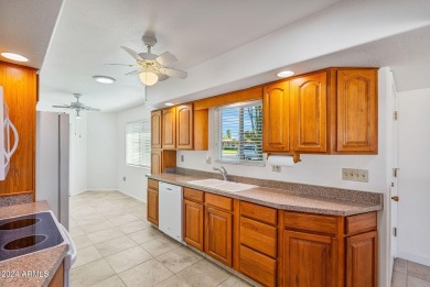 This charming 2-bedroom, 2-bathroom home spans 1,628 sqft and is on Sun City Riverview Golf Course in Arizona - for sale on GolfHomes.com, golf home, golf lot