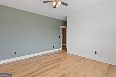 AMAZING OPPORTUNITY WITH RECENT PRICE IMPROVEMENT AND MOTIVATED on Traditions of Braselton Golf Club in Georgia - for sale on GolfHomes.com, golf home, golf lot