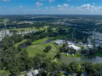 FRESH NEW LOOK!  NEWLY PAINTED THROUGHOUT. MOVE RIGHT IN AND on Betmar Acres Golf Club in Florida - for sale on GolfHomes.com, golf home, golf lot