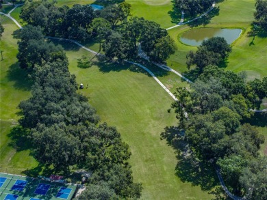 FRESH NEW LOOK!  NEWLY PAINTED THROUGHOUT. MOVE RIGHT IN AND on Betmar Acres Golf Club in Florida - for sale on GolfHomes.com, golf home, golf lot