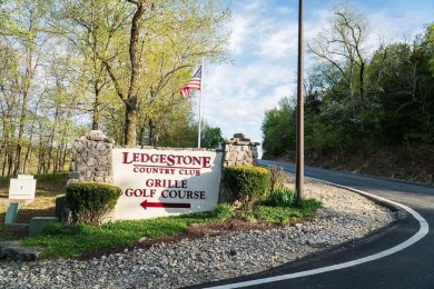 This beautifully appointed 2-bedroom, 2-bathroom fully furnished on Ledgestone Country Club and Golf Course in Missouri - for sale on GolfHomes.com, golf home, golf lot