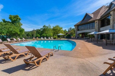 This beautifully appointed 2-bedroom, 2-bathroom fully furnished on Ledgestone Country Club and Golf Course in Missouri - for sale on GolfHomes.com, golf home, golf lot