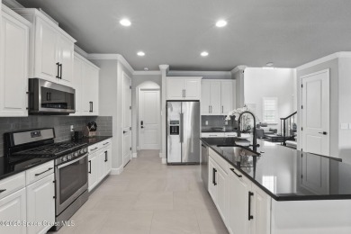 Discover luxury living in the heart of Viera at 3222 Casterton on Duran Golf Course in Florida - for sale on GolfHomes.com, golf home, golf lot