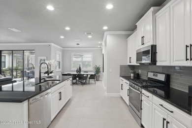 Discover luxury living in the heart of Viera at 3222 Casterton on Duran Golf Course in Florida - for sale on GolfHomes.com, golf home, golf lot
