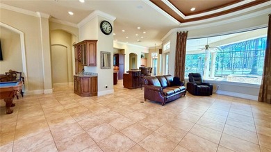 Experience elevated luxury living in this exceptional golf on Juliette Falls Golf and Spa Club in Florida - for sale on GolfHomes.com, golf home, golf lot