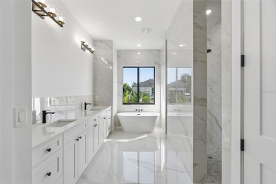 Welcome to this luxurious, modern, custom-built home perfectly on Rotonda Golf and Country Club - Long Marsh  in Florida - for sale on GolfHomes.com, golf home, golf lot