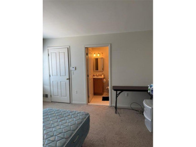 This Beautiful, Move-In-Ready Colonial Townhouse features many on Evergreen Hills Golf Course in Michigan - for sale on GolfHomes.com, golf home, golf lot